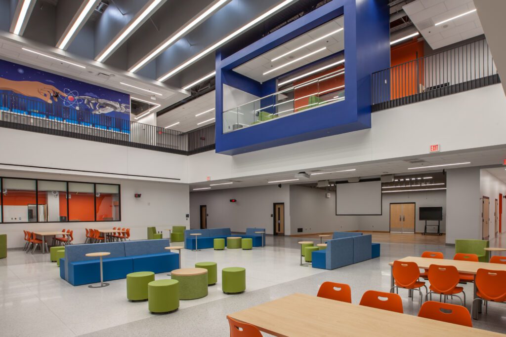 student social area with bright colors and collaborative seating