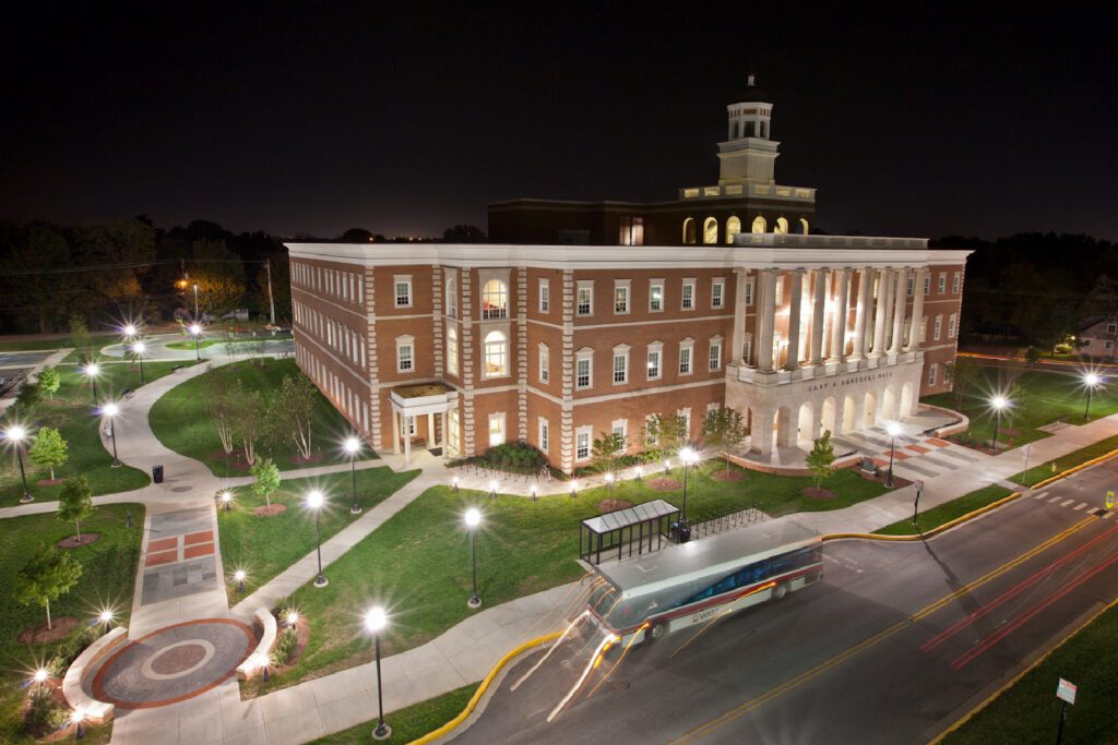higher education building exterior at night